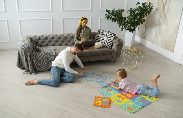 full-shot-parents-working-remotely